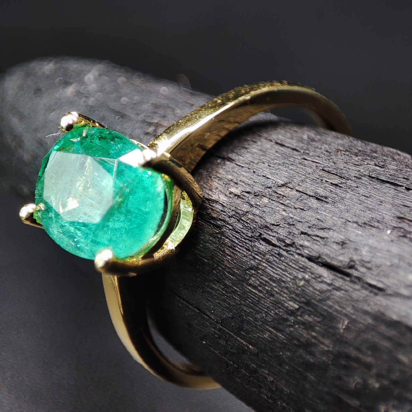 Emerald Solitaire Ring on Yellow Gold