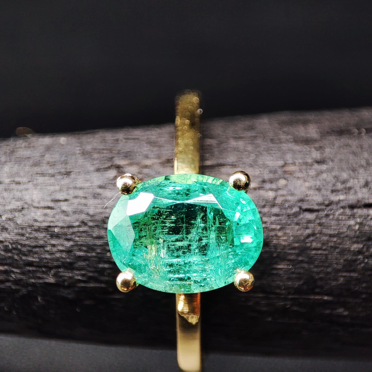 Emerald Solitaire Ring on Yellow Gold