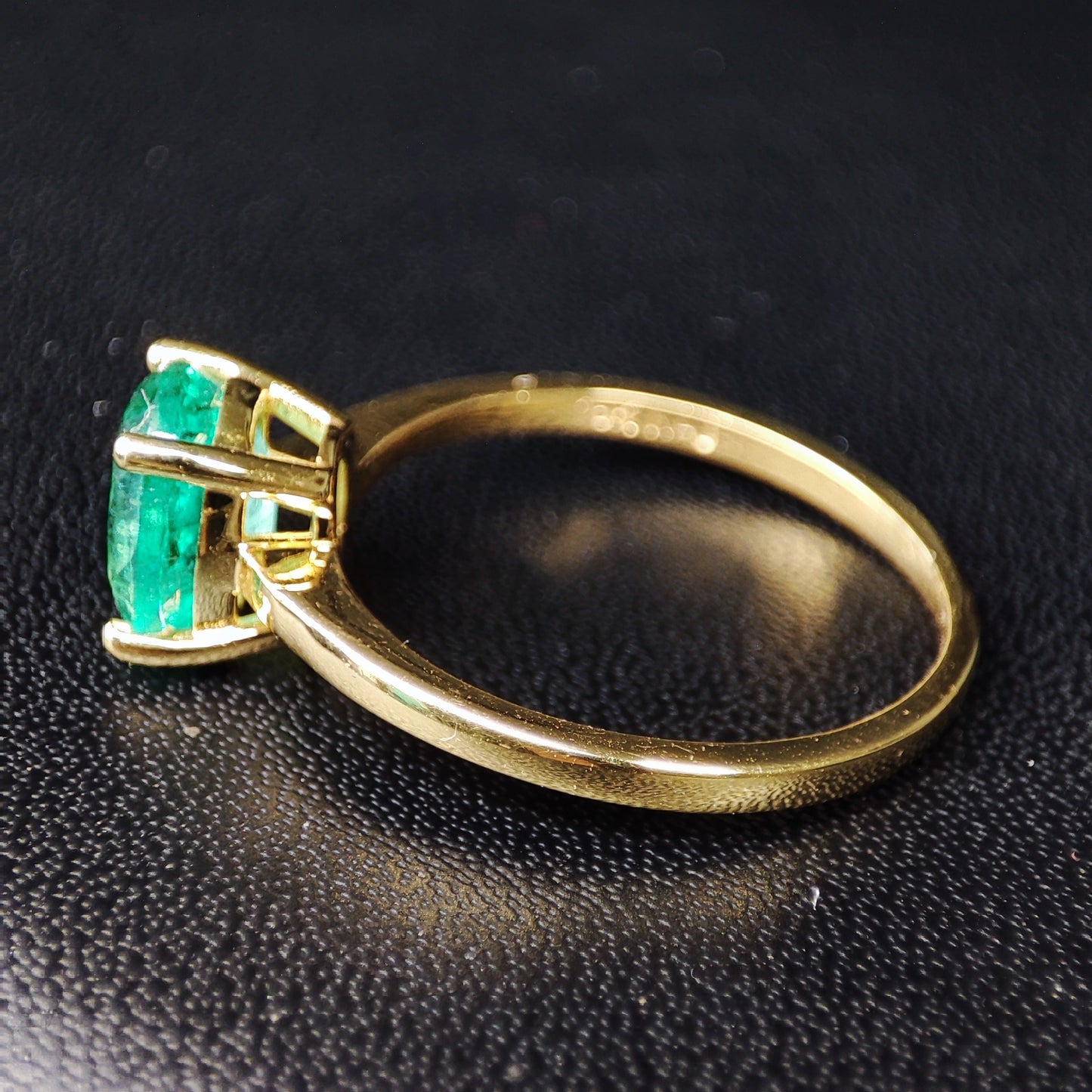 Emerald Solitaire Ring on Yellow Gold